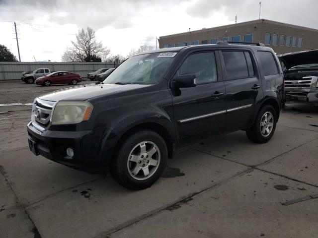 HONDA PILOT TOUR 2011 with VIN 5FNYF4H93BB033798 - Photo from auction