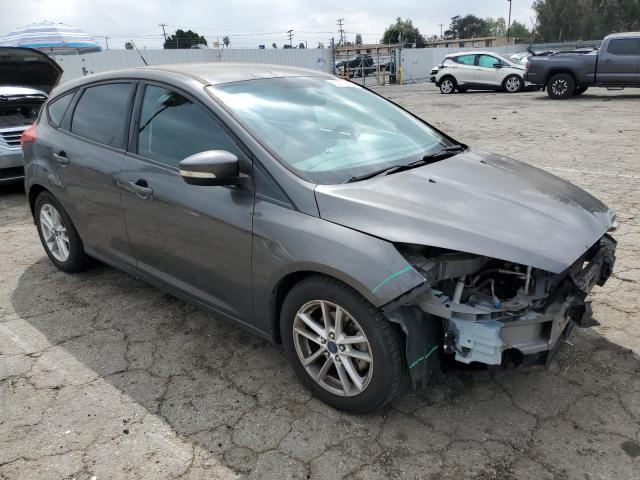 Снимка 4 от търг – 2015 FORD FOCUS SE с VIN 1FADP3K23FL369154