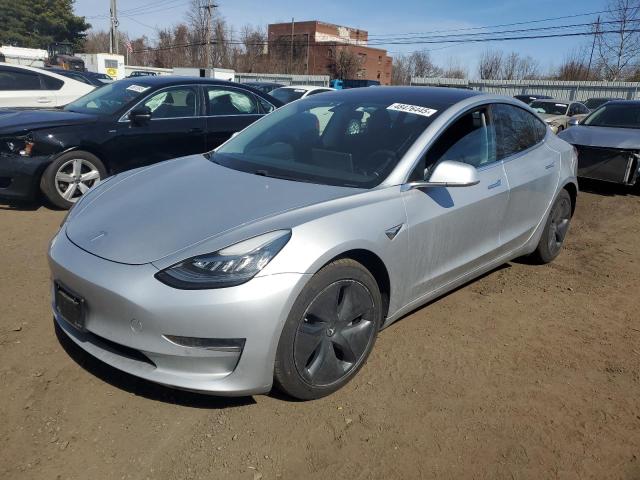 TESLA MODEL 3 2018 with VIN 5YJ3E1EB8JF065065 - Photo from auction