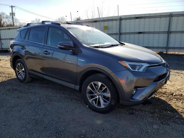 Photo 4 from auction – 2017 TOYOTA RAV4 HV LE with VIN JTMRJREV2HD118973