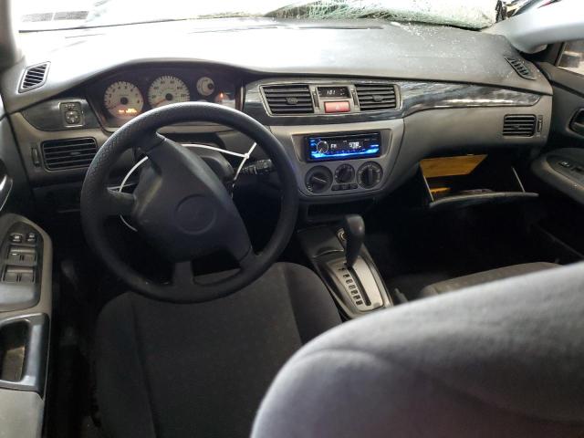 Снимка 8 от търг – 2004 MITSUBISHI LANCER с VIN JA3AD29F04U013596