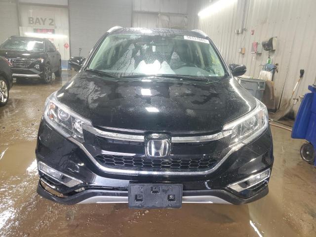 Photo 5 from auction – 2016 HONDA CR-V with VIN 5J6RM4H90GL128568