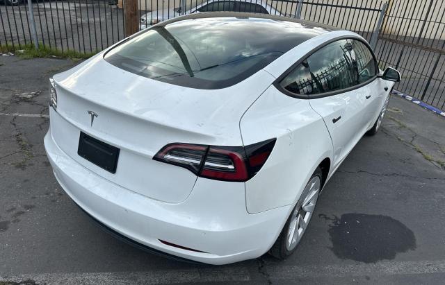 Photo 4 from auction – 2022 TESLA MODEL 3 with VIN 5YJ3E1EAXNF288253