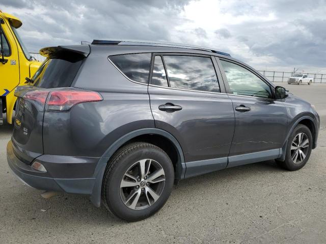 Photo 3 from auction – 2017 TOYOTA RAV4 XLE with VIN JTMRFREV2HJ709114