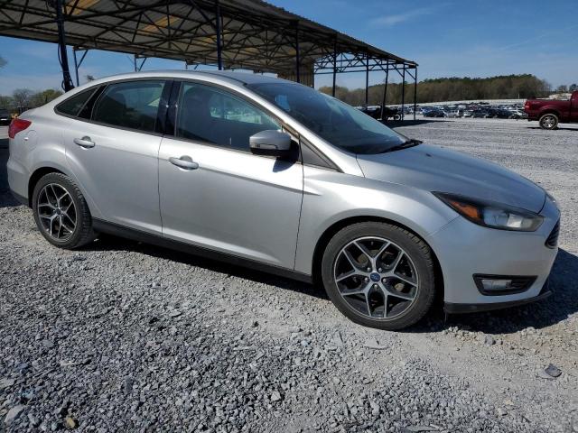 Снимка 4 от търг – 2017 FORD FOCUS SE с VIN 1FADP3FE0HL336863