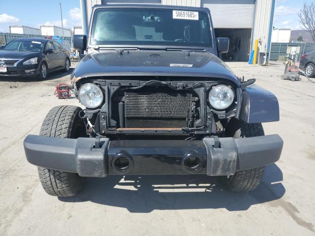 Photo 5 from auction – 2016 JEEP WRANGLER U with VIN 1C4BJWEGXGL243922