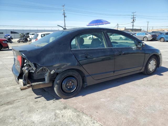 Photo 3 from auction – 2010 HONDA CIVIC HYBR with VIN JHMFA3F24AS004560