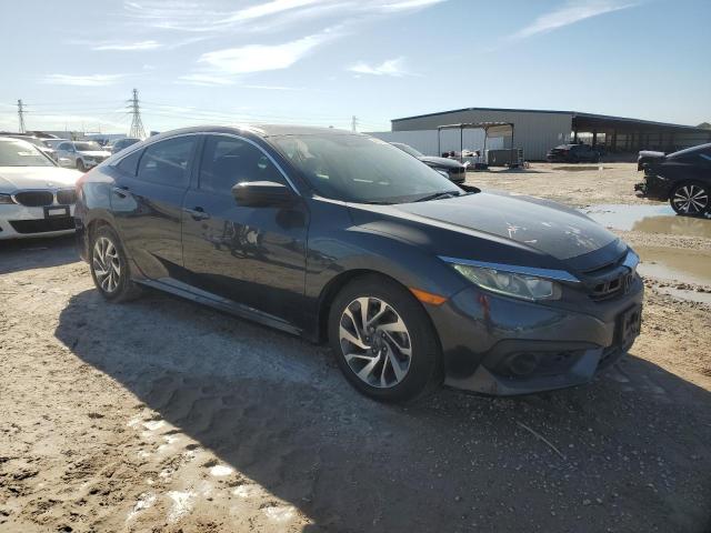 Photo 4 from auction – 2018 HONDA CIVIC EX with VIN 19XFC2F81JE023578