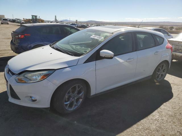 FORD FOCUS SE 2014 with VIN 1FADP3K25EL300271 - Photo from auction