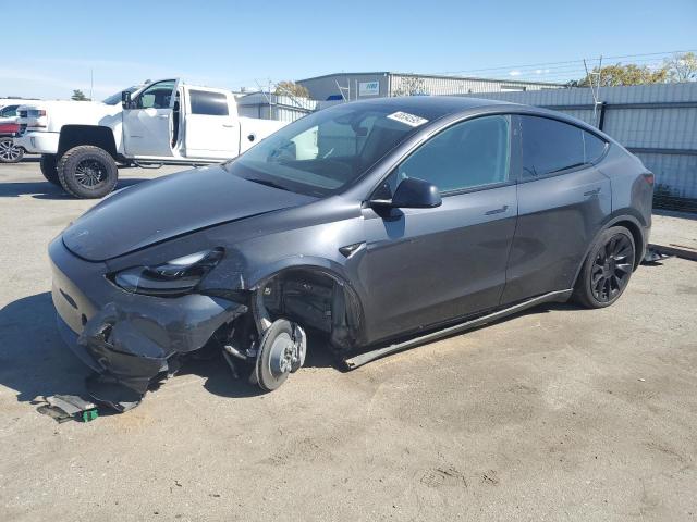 TESLA MODEL Y 2024 with VIN 7SAYGAEE1RF988643 - Photo from auction