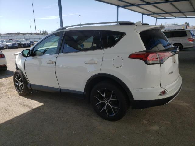 Photo 2 from auction – 2016 TOYOTA RAV4 SE with VIN JTMJFREV7GJ083524