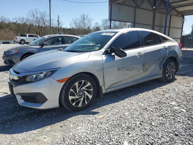 HONDA CIVIC EX 2017 с VIN 2HGFC2F73HH565403 - Фото с аукциона