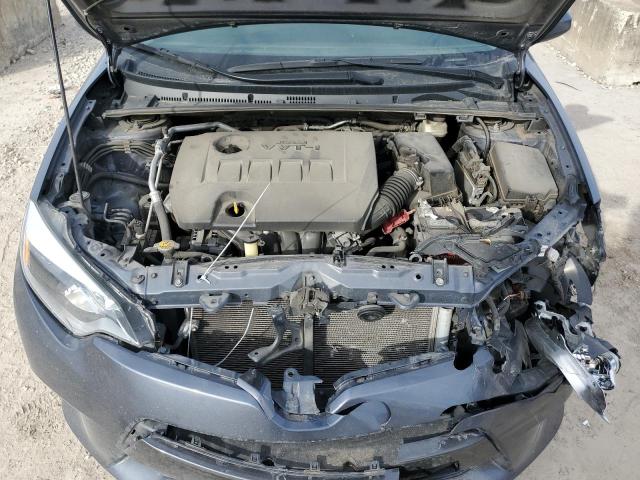 Photo 11 from auction – 2015 TOYOTA COROLLA L with VIN 5YFBURHE6FP290390
