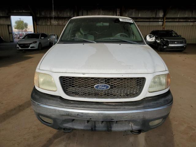 Photo 5 from auction – 2002 FORD F150 with VIN 1FTRX18L72NA19576