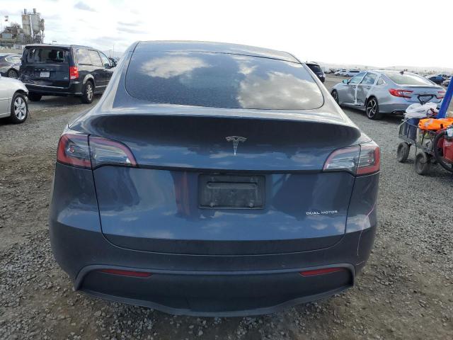 Снимка 6 от търг – 2022 TESLA MODEL Y с VIN 7SAYGDEE4NA018472