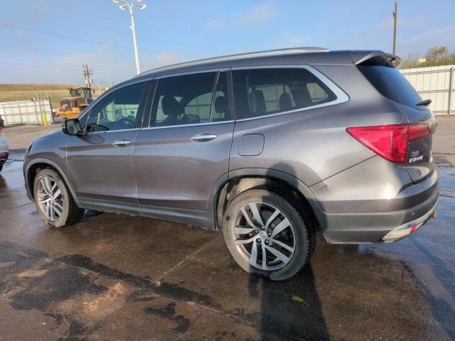 Photo 2 from auction – 2017 HONDA PILOT TOUR with VIN 5FNYF6H95HB083610