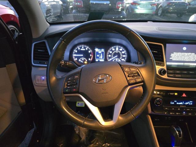 Photo 9 from auction – 2017 HYUNDAI TUCSON LIM with VIN KM8J33A28HU277623