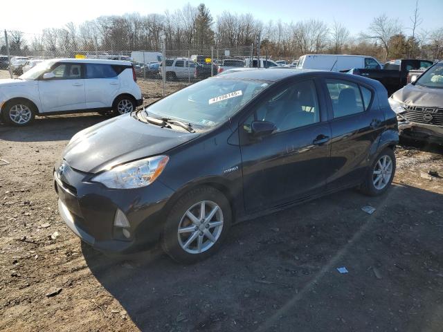 TOYOTA PRIUS C 2014 with VIN JTDKDTB33E1074584 - Photo from auction