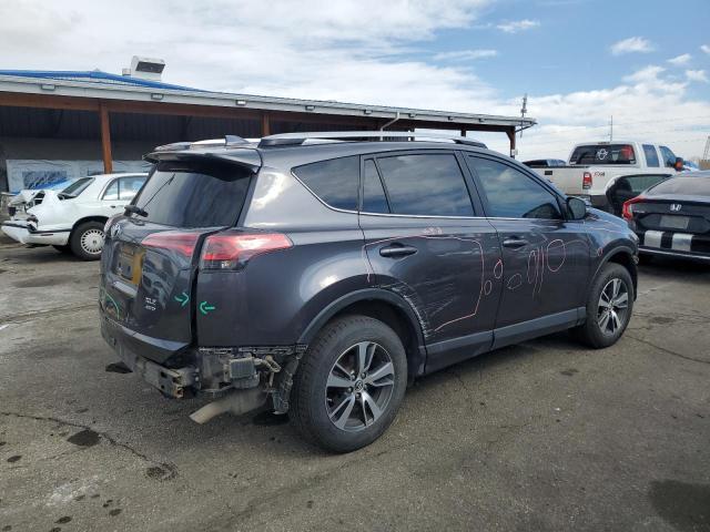 Photo 3 from auction – 2016 TOYOTA RAV4 XLE with VIN JTMRFREV4GJ059913