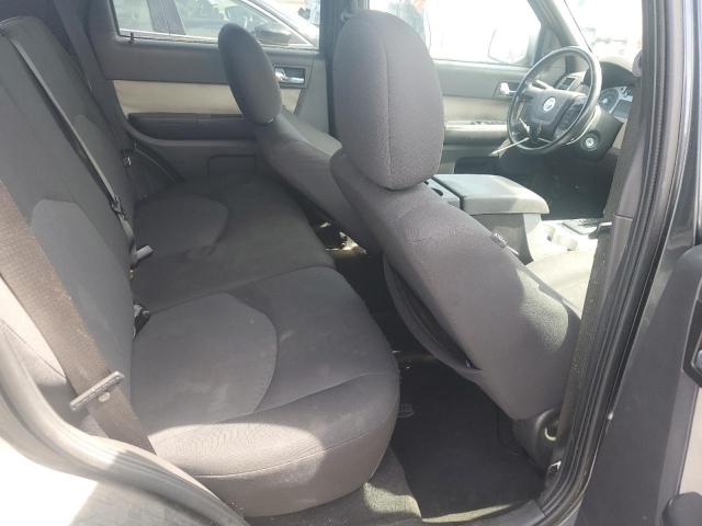 Photo 10 from auction – 2009 MERCURY MARINER with VIN 4M2CU81729KJ24116