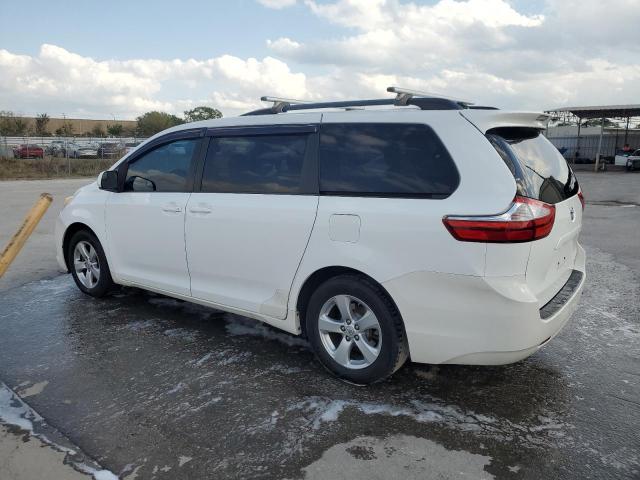Photo 2 from auction – 2015 TOYOTA SIENNA LE with VIN 5TDKK3DCXFS690175