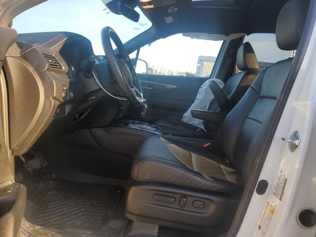 Photo 7 from auction – 2021 HONDA PASSPORT E with VIN 5FNYF8H52MB019382