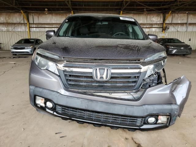 Photo 5 from auction – 2017 HONDA RIDGELINE with VIN 5FPYK3F64HB001781