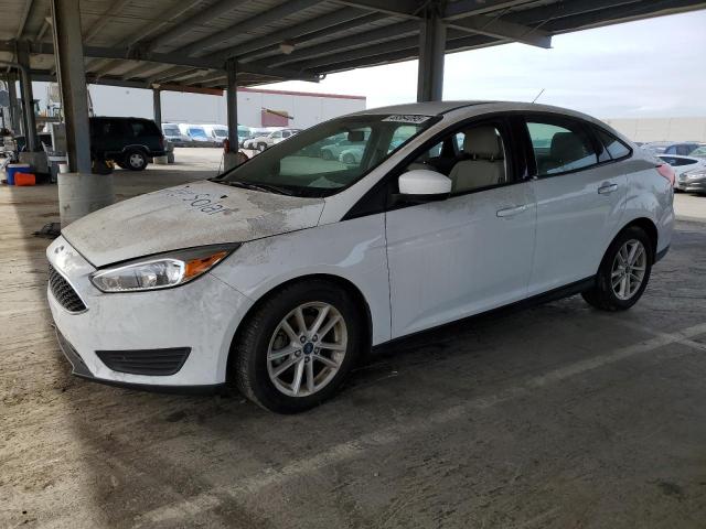 Снимка 1 от търг – 2018 FORD FOCUS SE с VIN 1FADP3FE9JL287992