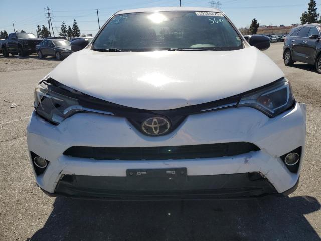 Photo 5 from auction – 2018 TOYOTA RAV4 LE with VIN 2T3ZFREV2JW460627