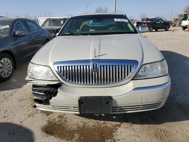 Photo 5 from auction – 2004 LINCOLN TOWN CAR U with VIN 1LNHM83W74Y670704