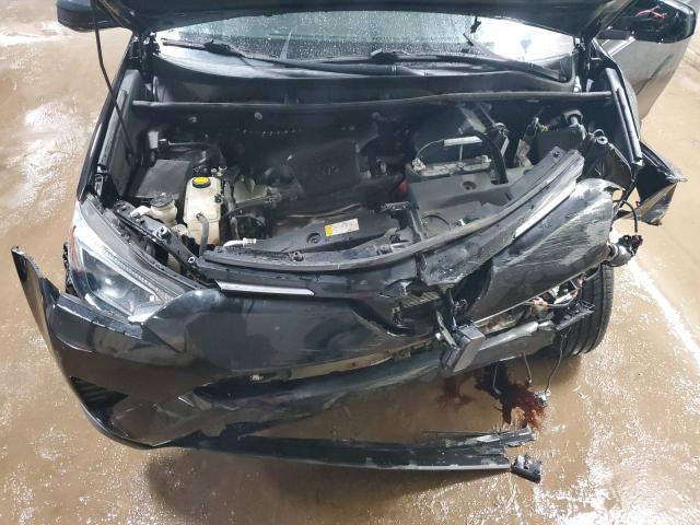 Photo 11 from auction – 2018 TOYOTA RAV4 LE with VIN 2T3BFREVXJW745884