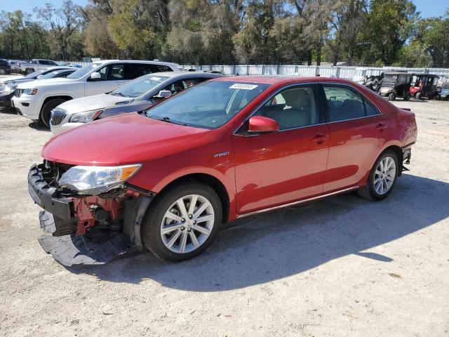 TOYOTA CAMRY HYBR 2012 with VIN 4T1BD1FK2CU042903 - Photo from auction