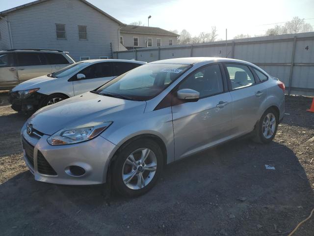 FORD FOCUS SE 2014 with VIN 1FADP3F23EL101925 - Photo from auction