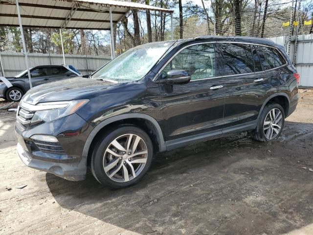 Photo 1 from auction – 2018 HONDA PILOT ELIT with VIN 5FNYF6H0XJB012796