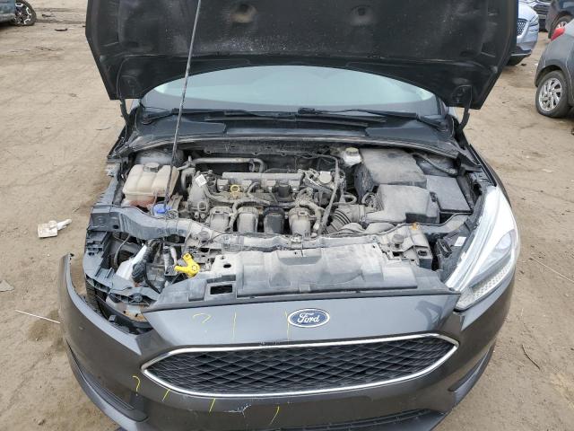 Снимка 11 от търг – 2017 FORD FOCUS SE с VIN 1FADP3K27HL318467