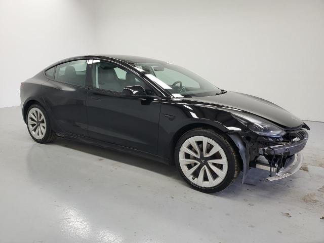 Снимка 4 от търг – 2022 TESLA MODEL 3 с VIN 5YJ3E1EA1NF370565
