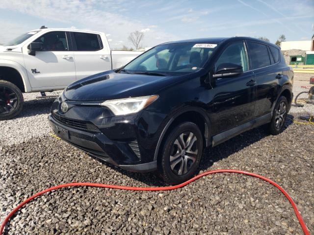 TOYOTA RAV4 LE 2018 with VIN 2T3BFREV8JW777586 - Photo from auction