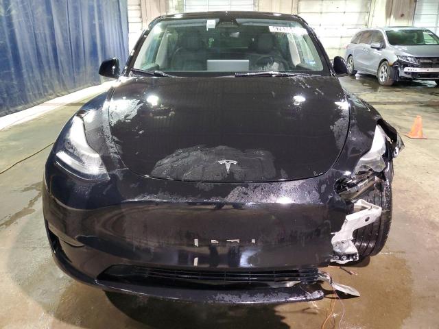 Снимка 5 от търг – 2023 TESLA MODEL Y с VIN 7SAYGDEE8PA044222