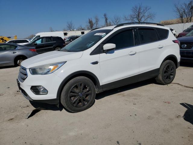 FORD ESCAPE SE 2018 with VIN 1FMCU9GD2JUA27043 - Photo from auction