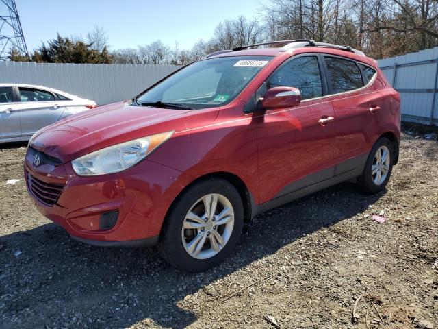 HYUNDAI TUCSON GLS 2012 with VIN KM8JUCAC3CU492003 - Photo from auction
