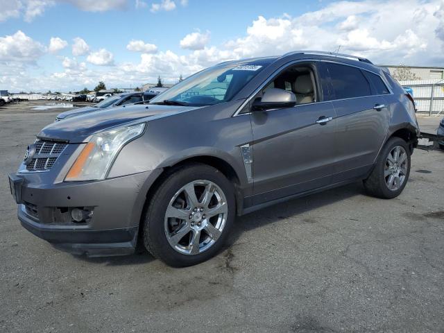 CADILLAC SRX PERFOR 2012 with VIN 3GYFNBE38CS579062 - Photo from auction