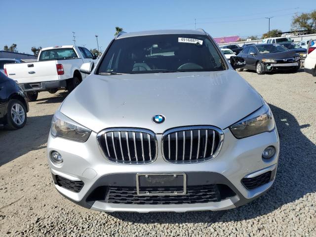 Photo 5 from auction – 2016 BMW X1 XDRIVE2 with VIN WBXHT3C35G5E51218