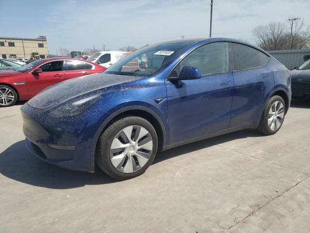 TESLA MODEL Y 2024 with VIN 7SAYGDEE4RA272785 - Photo from auction