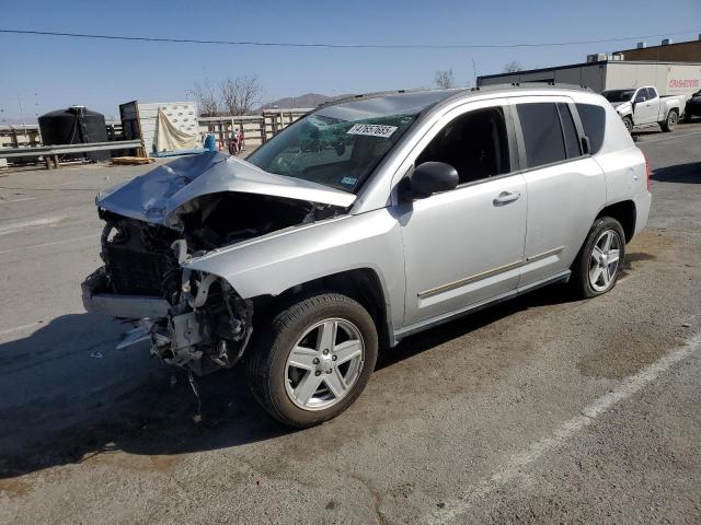 JEEP COMPASS SP 2010 with VIN 1J4NT4FB7AD549325 - Photo from auction