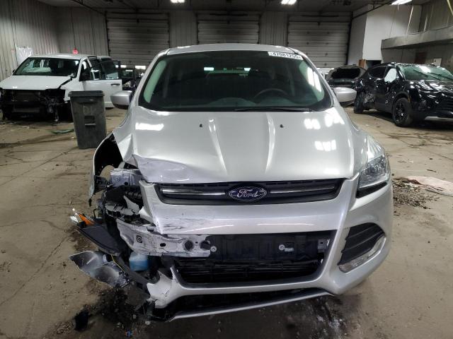 Photo 5 from auction – 2014 FORD ESCAPE SE with VIN 1FMCU9GX7EUD85559