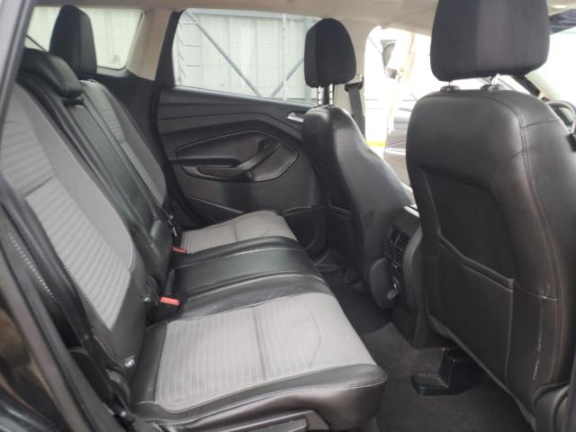 Photo 11 from auction – 2017 FORD ESCAPE SE with VIN 1FMCU9GD4HUC46998