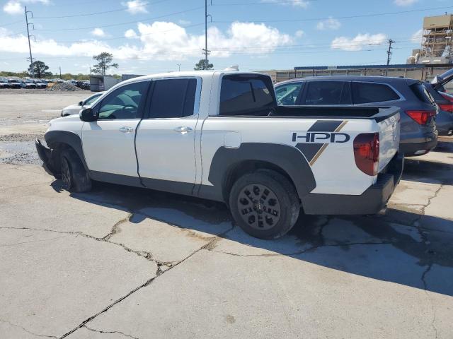 Photo 2 from auction – 2022 HONDA RIDGELINE with VIN 5FPYK3F72NB018843