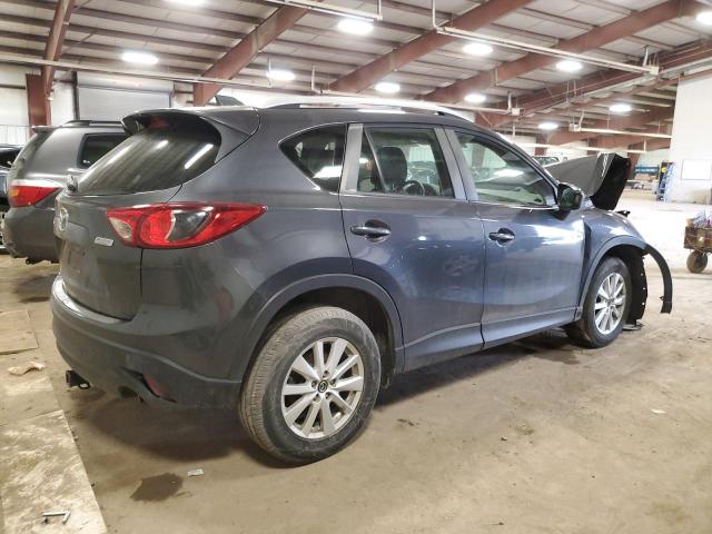 Photo 3 from auction – 2014 MAZDA CX-5 SPORT with VIN JM3KE2BE3E0346332