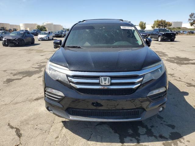 Photo 5 from auction – 2016 HONDA PILOT TOUR with VIN 5FNYF6H98GB076410