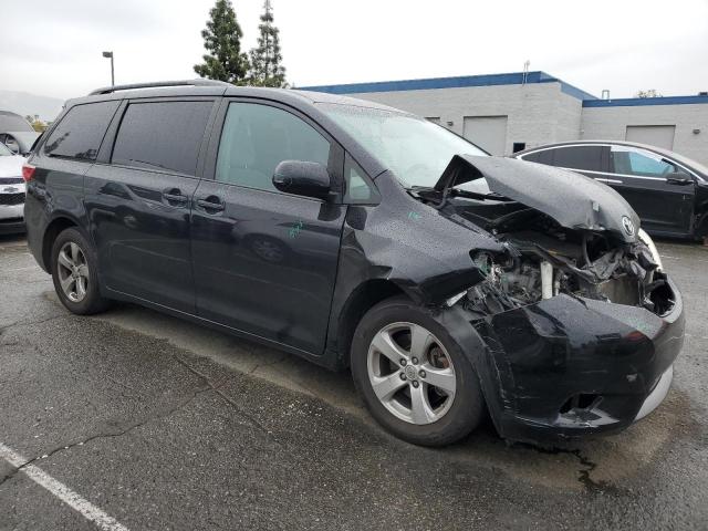 Photo 4 from auction – 2015 TOYOTA SIENNA LE with VIN 5TDKK3DC8FS572142